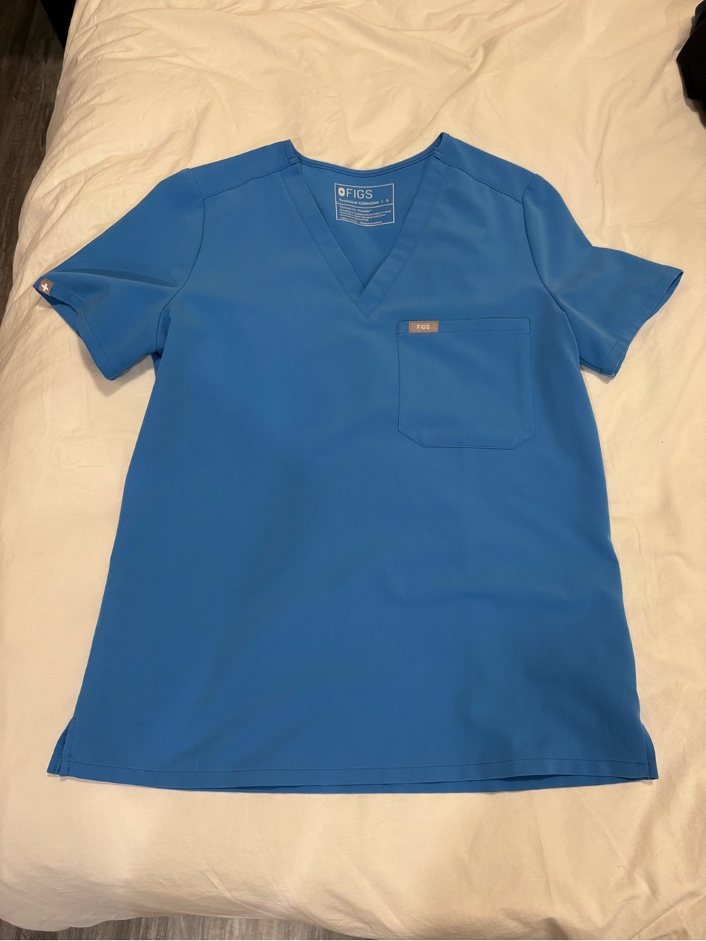 Figs bright blue scrub top - size small
